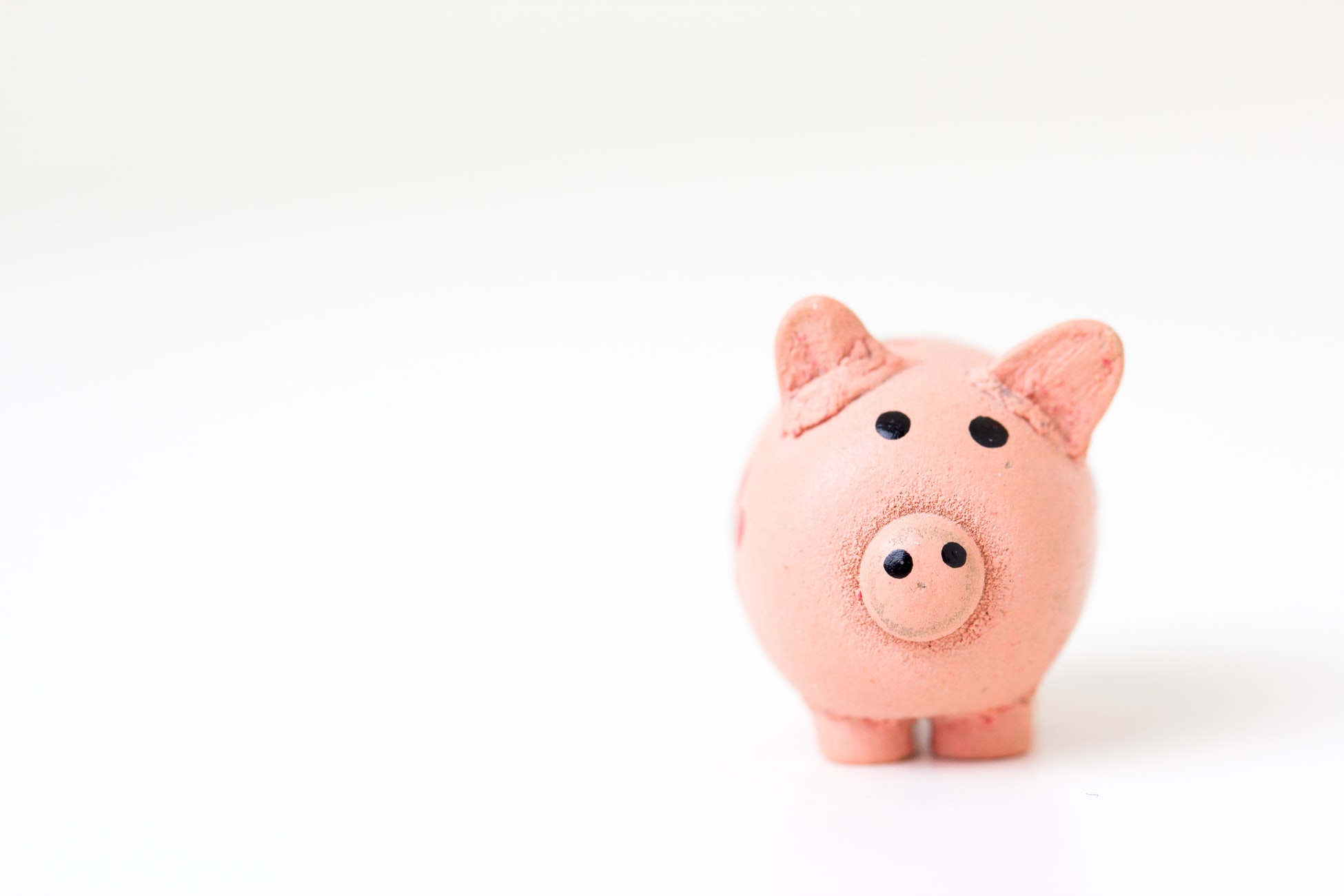Cute image of piggy bank starting right at you